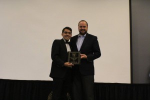 Brother King receiving his Order of Omega award.